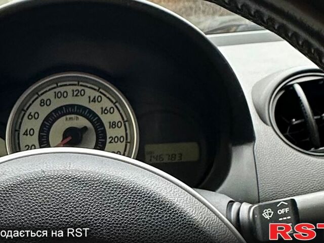 Серый Мазда 2, объемом двигателя 13 л и пробегом 147 тыс. км за 5200 $, фото 1 на Automoto.ua