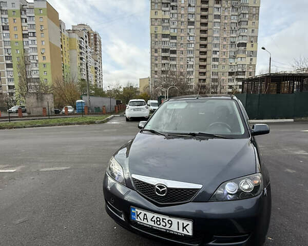 Серый Мазда 2, объемом двигателя 1.39 л и пробегом 177 тыс. км за 4700 $, фото 1 на Automoto.ua