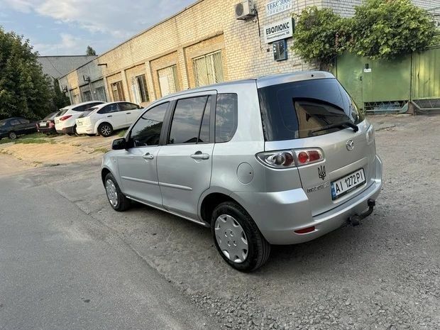 Серый Мазда 2, объемом двигателя 1.4 л и пробегом 268 тыс. км за 3192 $, фото 2 на Automoto.ua