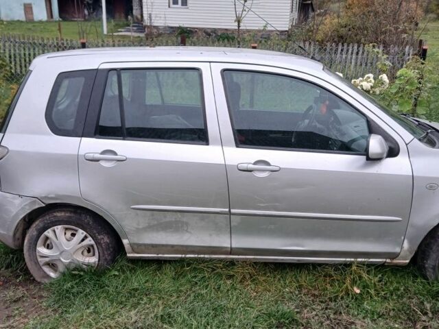 Сірий Мазда 2, об'ємом двигуна 1.4 л та пробігом 250 тис. км за 500 $, фото 1 на Automoto.ua