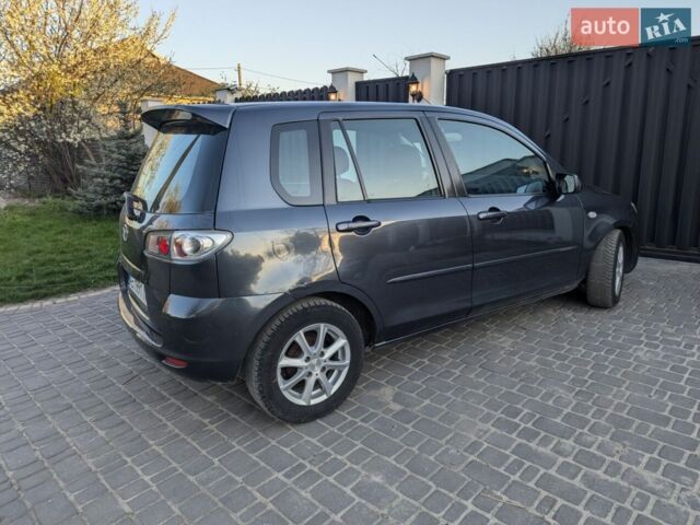 Сірий Мазда 2, об'ємом двигуна 1.39 л та пробігом 220 тис. км за 4799 $, фото 4 на Automoto.ua
