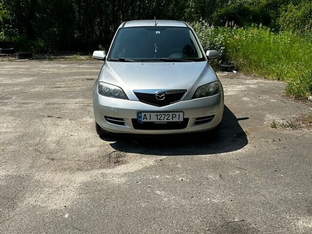 Сірий Мазда 2, об'ємом двигуна 1.39 л та пробігом 267 тис. км за 3200 $, фото 6 на Automoto.ua