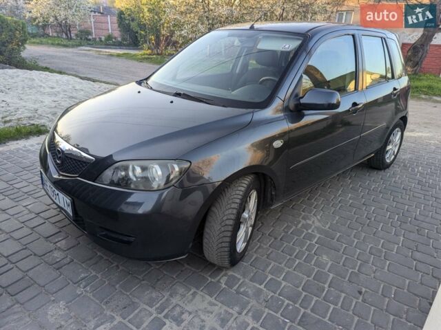 Сірий Мазда 2, об'ємом двигуна 1.39 л та пробігом 220 тис. км за 4799 $, фото 3 на Automoto.ua