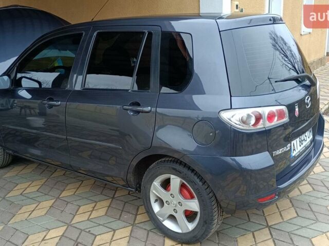 Сірий Мазда 2, об'ємом двигуна 1.4 л та пробігом 190 тис. км за 4850 $, фото 5 на Automoto.ua