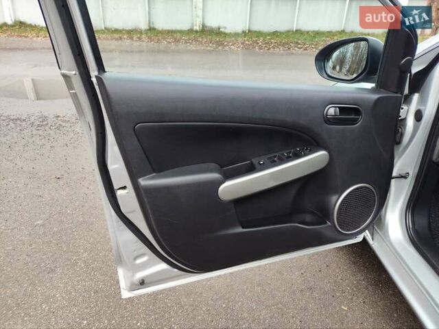 Сірий Мазда 2, об'ємом двигуна 1.4 л та пробігом 230 тис. км за 4800 $, фото 11 на Automoto.ua