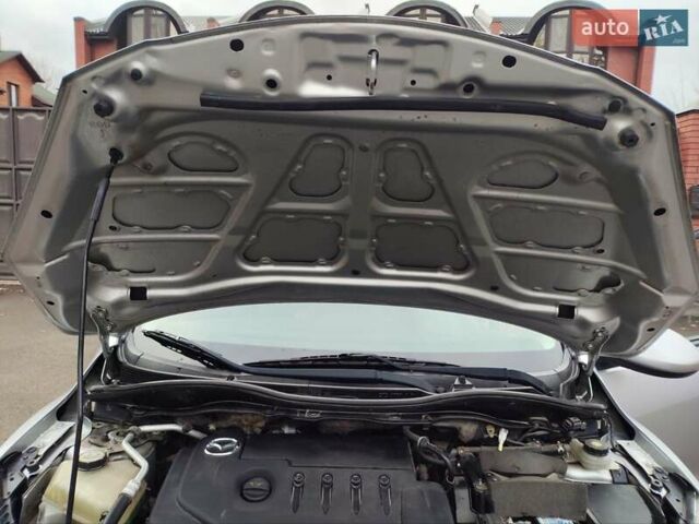 Сірий Мазда 2, об'ємом двигуна 1.4 л та пробігом 230 тис. км за 4800 $, фото 22 на Automoto.ua