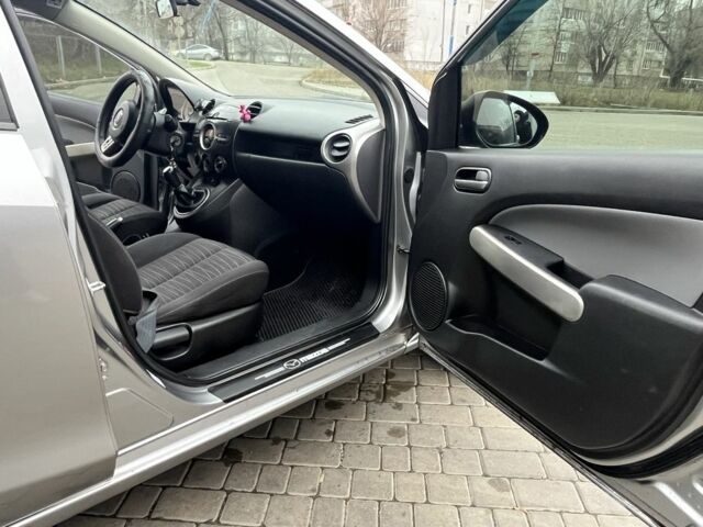 Серый Мазда 2, объемом двигателя 1.4 л и пробегом 249 тыс. км за 4700 $, фото 14 на Automoto.ua