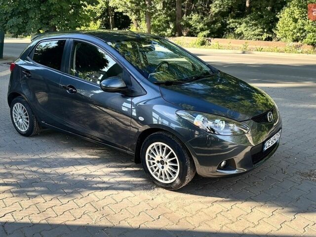 Сірий Мазда 2, об'ємом двигуна 1.35 л та пробігом 245 тис. км за 4500 $, фото 3 на Automoto.ua