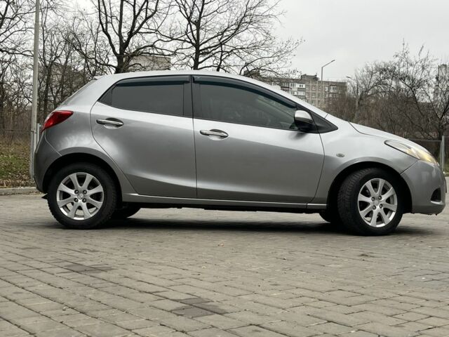 Серый Мазда 2, объемом двигателя 1.4 л и пробегом 249 тыс. км за 4700 $, фото 1 на Automoto.ua