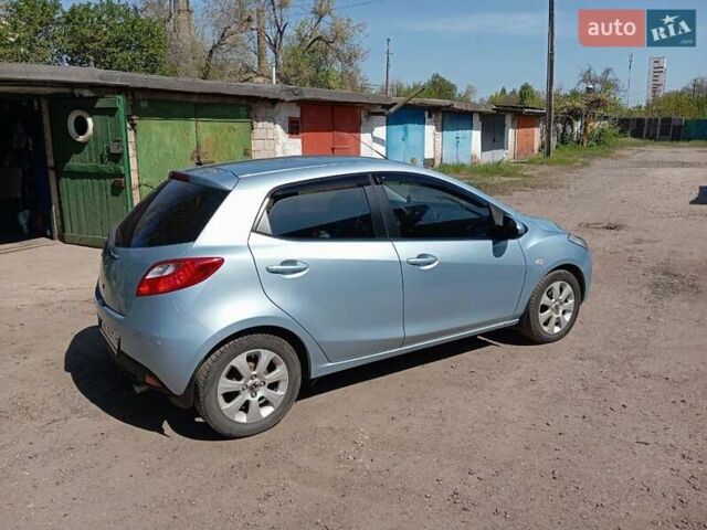 Серый Мазда 2, объемом двигателя 1.5 л и пробегом 130 тыс. км за 6500 $, фото 1 на Automoto.ua