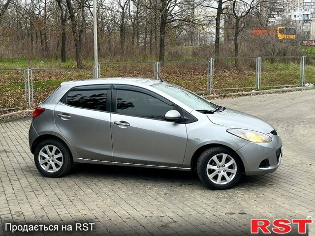Сірий Мазда 2, об'ємом двигуна 1.4 л та пробігом 249 тис. км за 4700 $, фото 5 на Automoto.ua