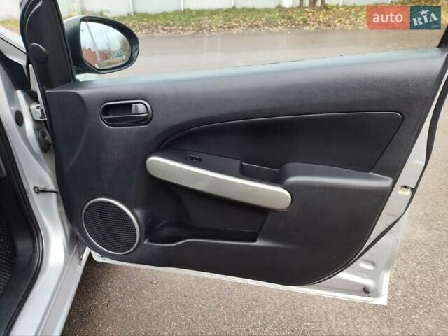 Сірий Мазда 2, об'ємом двигуна 1.4 л та пробігом 230 тис. км за 4800 $, фото 19 на Automoto.ua