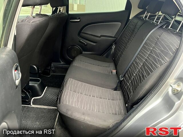 Сірий Мазда 2, об'ємом двигуна 1.4 л та пробігом 249 тис. км за 4700 $, фото 10 на Automoto.ua