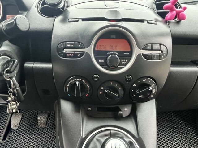 Серый Мазда 2, объемом двигателя 1.4 л и пробегом 249 тыс. км за 4700 $, фото 19 на Automoto.ua