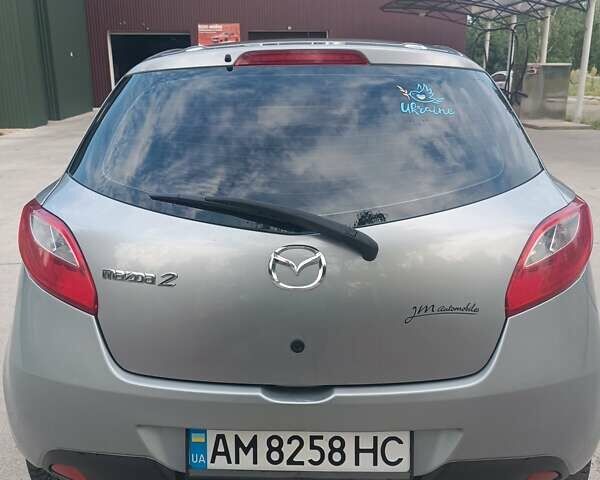 Сірий Мазда 2, об'ємом двигуна 1.4 л та пробігом 246 тис. км за 5498 $, фото 4 на Automoto.ua