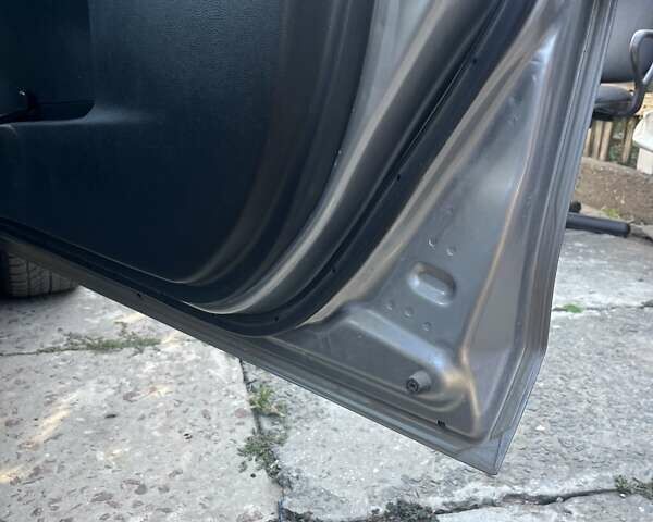 Серый Мазда 2, объемом двигателя 1.3 л и пробегом 244 тыс. км за 5200 $, фото 4 на Automoto.ua