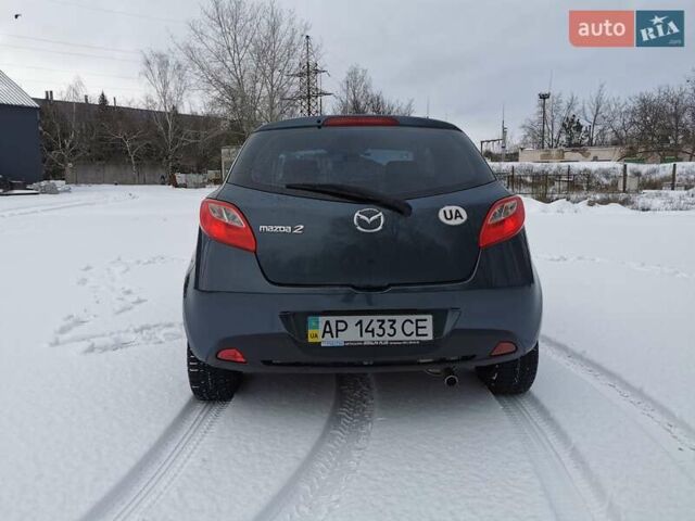 Серый Мазда 2, объемом двигателя 1.5 л и пробегом 178 тыс. км за 6050 $, фото 4 на Automoto.ua