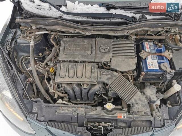 Серый Мазда 2, объемом двигателя 1.5 л и пробегом 178 тыс. км за 6050 $, фото 11 на Automoto.ua