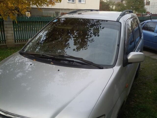 Сірий Мазда 2, об'ємом двигуна 2 л та пробігом 250 тис. км за 2400 $, фото 10 на Automoto.ua