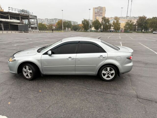 Сірий Мазда 2, об'ємом двигуна 2 л та пробігом 210 тис. км за 6194 $, фото 3 на Automoto.ua