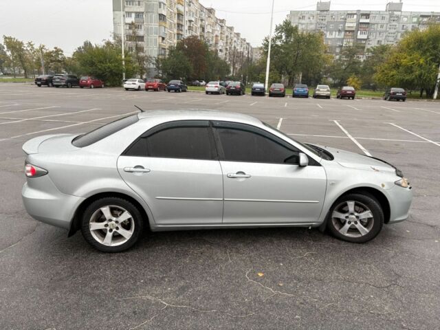 Сірий Мазда 2, об'ємом двигуна 2 л та пробігом 210 тис. км за 6194 $, фото 7 на Automoto.ua