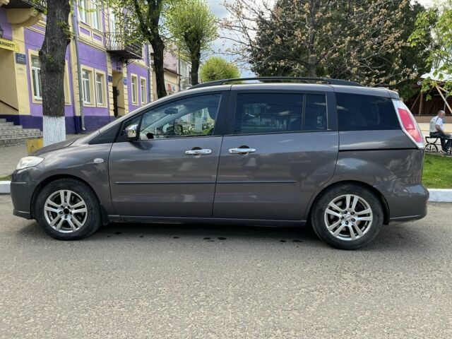 Серый Мазда 2, объемом двигателя 2 л и пробегом 236 тыс. км за 8224 $, фото 5 на Automoto.ua