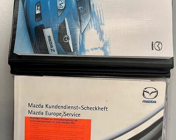 Синій Мазда 2, об'ємом двигуна 0 л та пробігом 58 тис. км за 4800 $, фото 28 на Automoto.ua