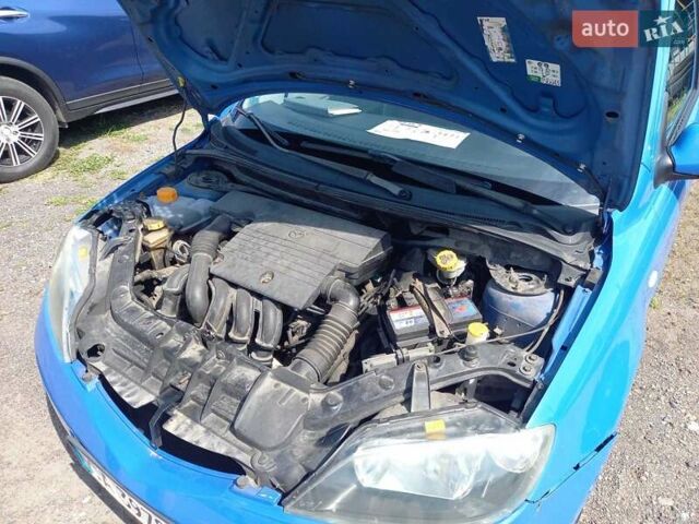 Синий Мазда 2, объемом двигателя 1.4 л и пробегом 133 тыс. км за 4150 $, фото 28 на Automoto.ua