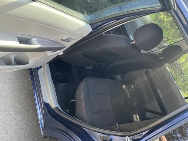 Синий Мазда 2, объемом двигателя 1.4 л и пробегом 225 тыс. км за 3600 $, фото 7 на Automoto.ua