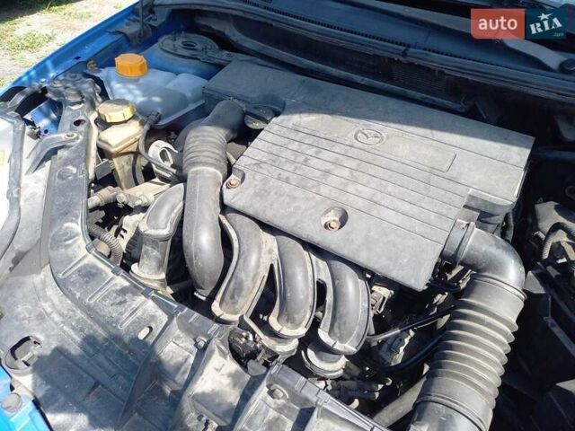 Синий Мазда 2, объемом двигателя 1.4 л и пробегом 133 тыс. км за 4150 $, фото 29 на Automoto.ua