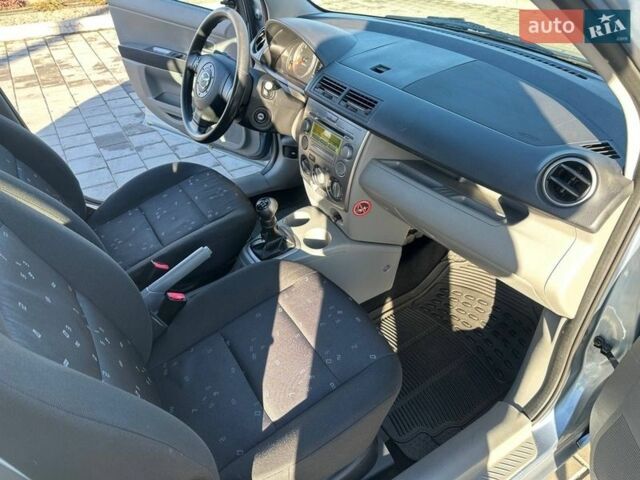 Синий Мазда 2, объемом двигателя 1.4 л и пробегом 90 тыс. км за 4200 $, фото 15 на Automoto.ua