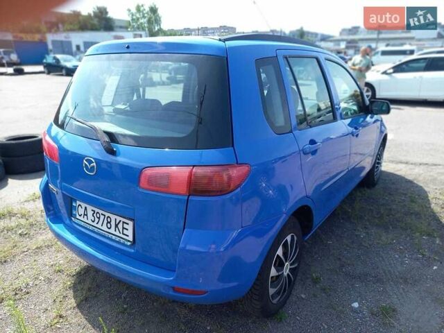 Синий Мазда 2, объемом двигателя 1.4 л и пробегом 133 тыс. км за 4150 $, фото 4 на Automoto.ua