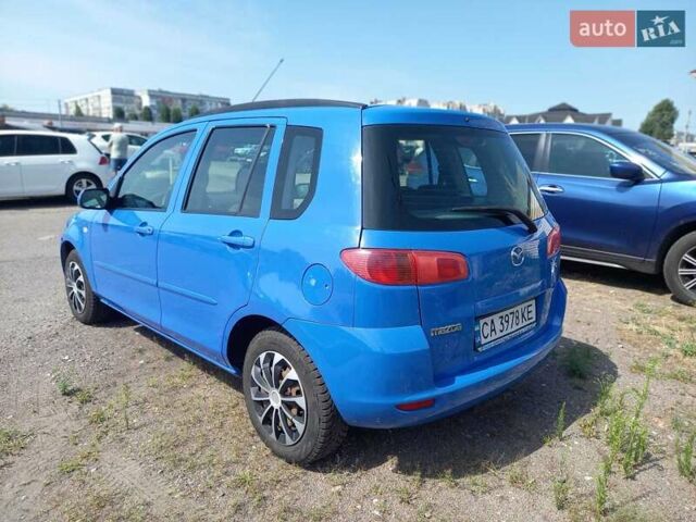 Синий Мазда 2, объемом двигателя 1.4 л и пробегом 133 тыс. км за 4150 $, фото 5 на Automoto.ua