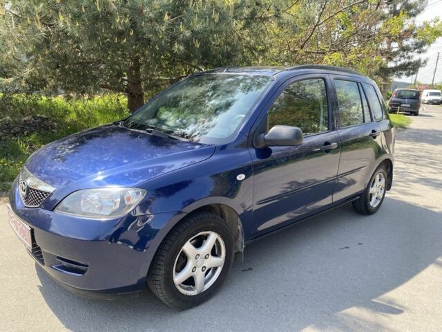 Синий Мазда 2, объемом двигателя 1.4 л и пробегом 225 тыс. км за 4000 $, фото 3 на Automoto.ua