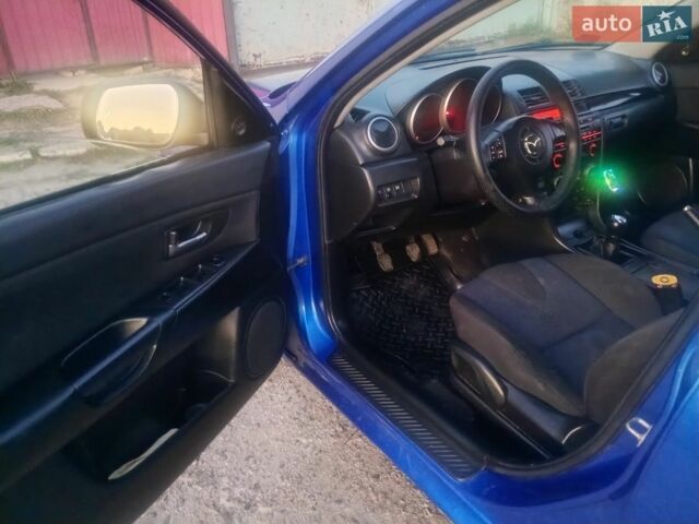 Синий Мазда 2, объемом двигателя 1.6 л и пробегом 290 тыс. км за 2850 $, фото 4 на Automoto.ua