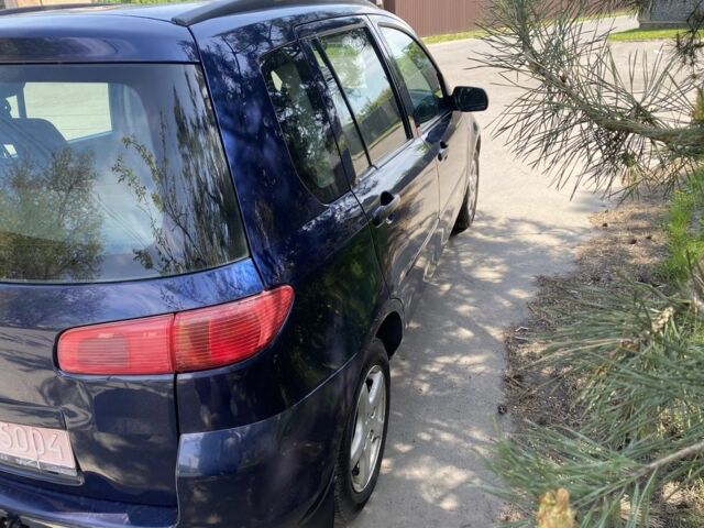 Синий Мазда 2, объемом двигателя 1.4 л и пробегом 225 тыс. км за 3600 $, фото 5 на Automoto.ua