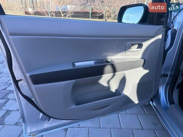 Синий Мазда 2, объемом двигателя 1.4 л и пробегом 90 тыс. км за 4200 $, фото 21 на Automoto.ua