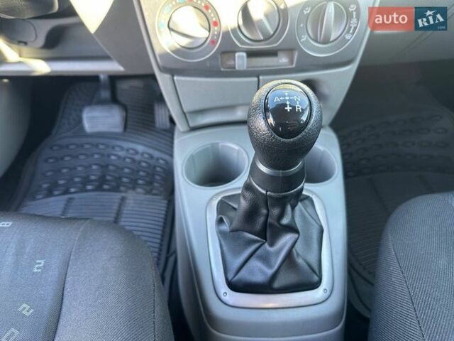 Синий Мазда 2, объемом двигателя 1.4 л и пробегом 90 тыс. км за 4200 $, фото 19 на Automoto.ua