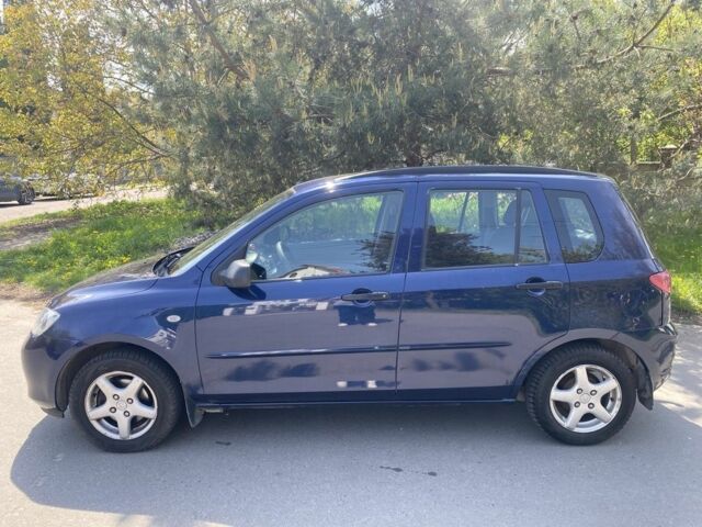 Синий Мазда 2, объемом двигателя 1.4 л и пробегом 225 тыс. км за 3600 $, фото 2 на Automoto.ua