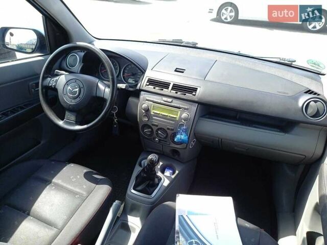 Синий Мазда 2, объемом двигателя 1.4 л и пробегом 133 тыс. км за 4150 $, фото 15 на Automoto.ua