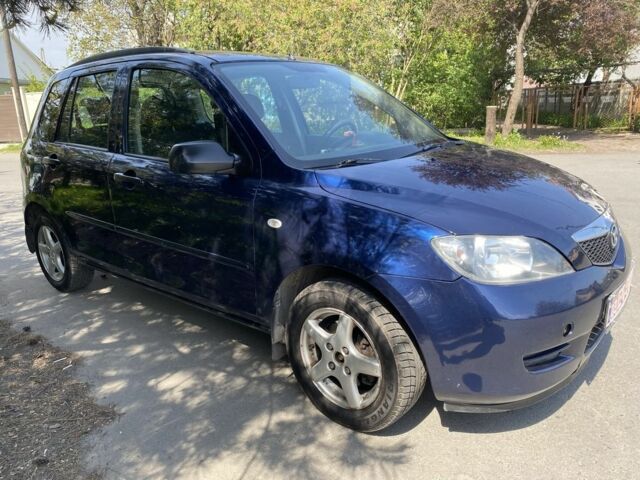Синий Мазда 2, объемом двигателя 1.4 л и пробегом 225 тыс. км за 3600 $, фото 1 на Automoto.ua