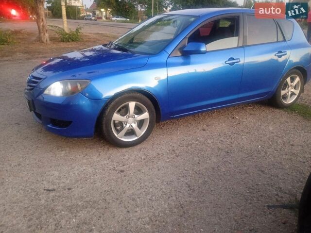 Синий Мазда 2, объемом двигателя 1.6 л и пробегом 290 тыс. км за 2850 $, фото 1 на Automoto.ua