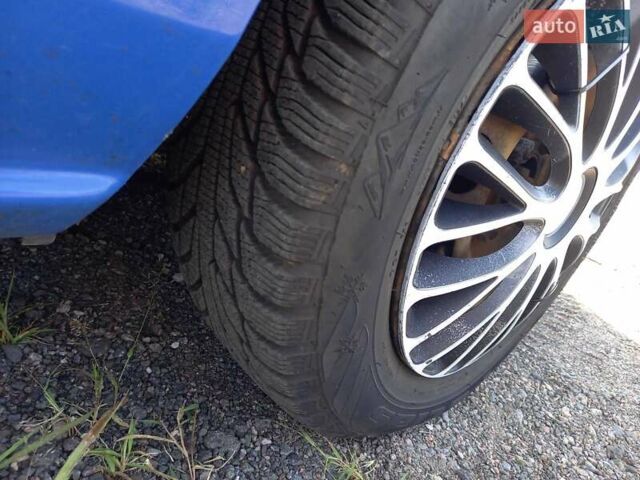 Синий Мазда 2, объемом двигателя 1.4 л и пробегом 133 тыс. км за 4150 $, фото 3 на Automoto.ua