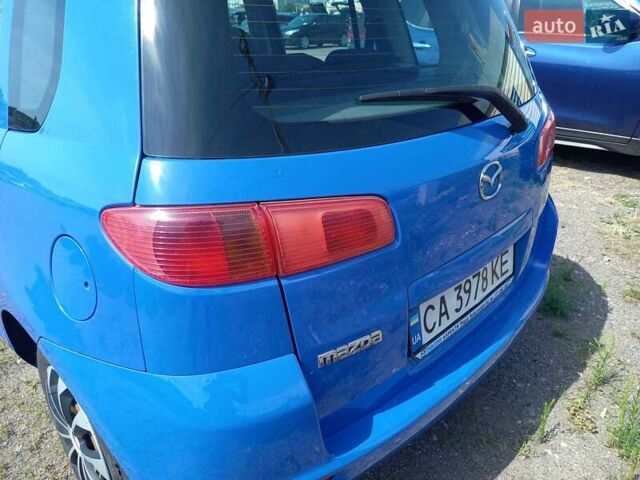 Синий Мазда 2, объемом двигателя 1.4 л и пробегом 133 тыс. км за 4150 $, фото 7 на Automoto.ua