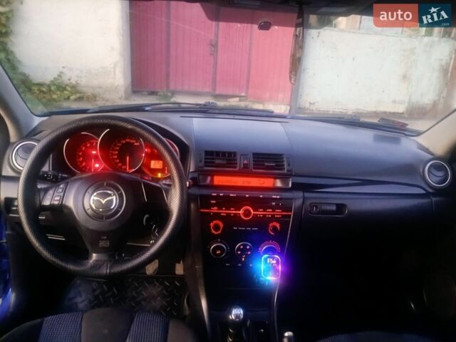 Синий Мазда 2, объемом двигателя 1.6 л и пробегом 290 тыс. км за 2850 $, фото 3 на Automoto.ua