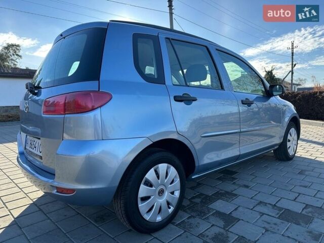 Синий Мазда 2, объемом двигателя 1.4 л и пробегом 90 тыс. км за 4200 $, фото 7 на Automoto.ua