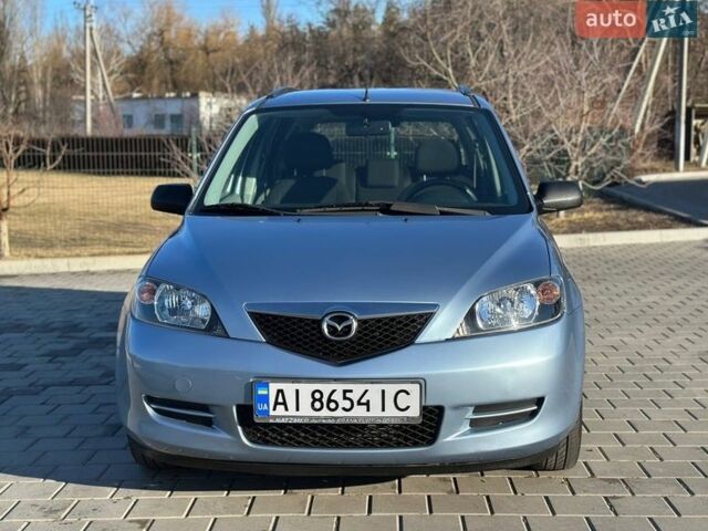 Синий Мазда 2, объемом двигателя 1.4 л и пробегом 90 тыс. км за 4200 $, фото 9 на Automoto.ua
