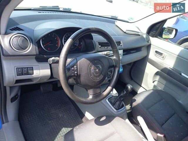 Синий Мазда 2, объемом двигателя 1.4 л и пробегом 133 тыс. км за 4150 $, фото 24 на Automoto.ua