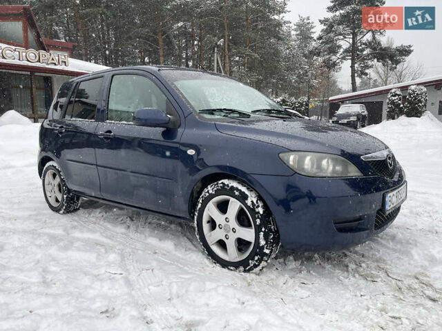 Синій Мазда 2, об'ємом двигуна 1.4 л та пробігом 178 тис. км за 3999 $, фото 7 на Automoto.ua