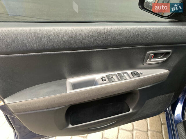 Синий Мазда 2, объемом двигателя 1.4 л и пробегом 185 тыс. км за 5700 $, фото 16 на Automoto.ua